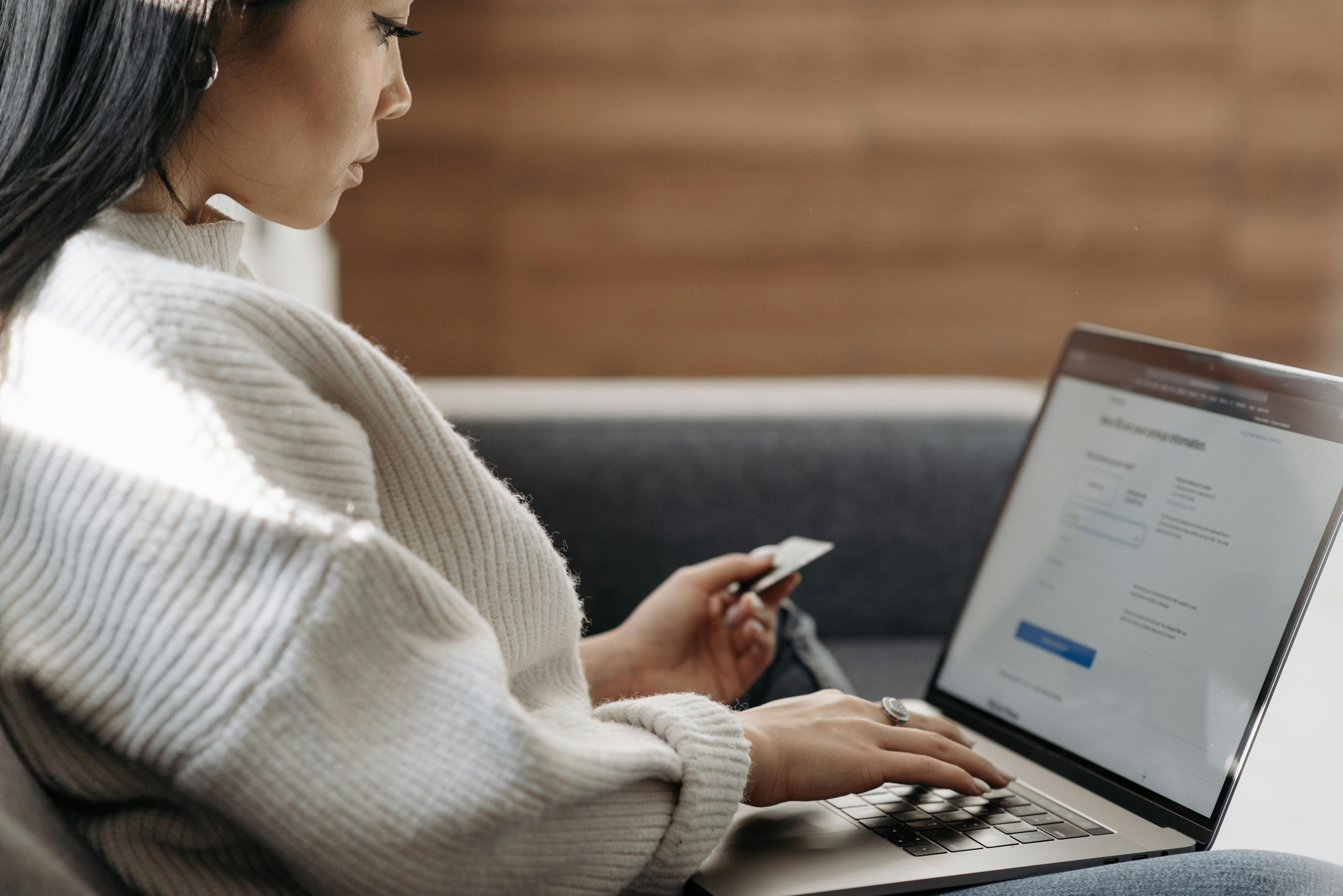 Shopper using an online promo code at checkout